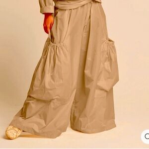 Elegant Tan Wide Leg Nylon Pant
Size L.